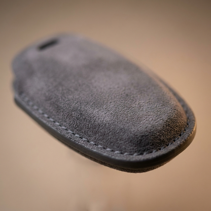 Macro detail of the Alcantara texture and stitching